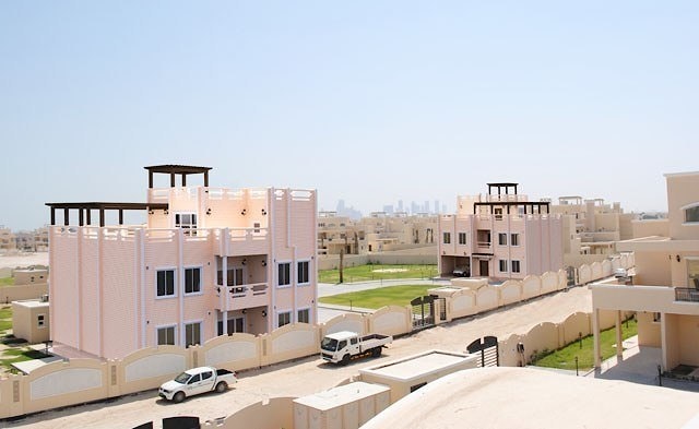 Drewniany domek nad morzem w Doha, "Domek 562" projekt  